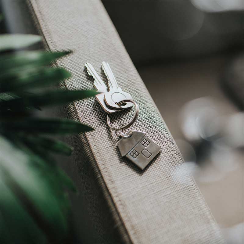 Two keys on a house key ring